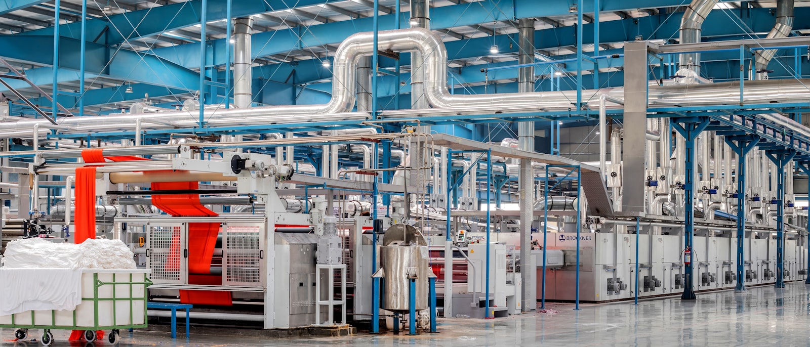 industrial textile factory with machinery and pipes