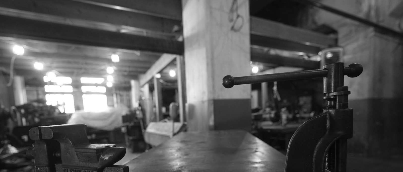 Vintage workbench with vises in a workshop