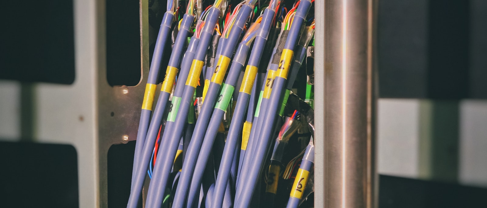 A blue network cable plugged into a router